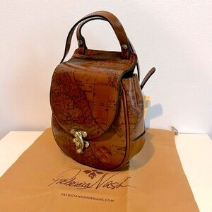 ‘Signature Map’ Saddle Crossbody leather Bag. Patricia Nash